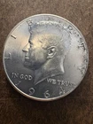 1964 Kennedy 90% Silver Half Dollar.           #48