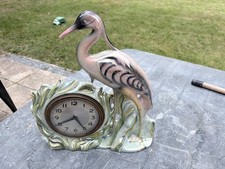 Ancienne horloge porcelaine décorative Héron, MARQUE : SCOUT
