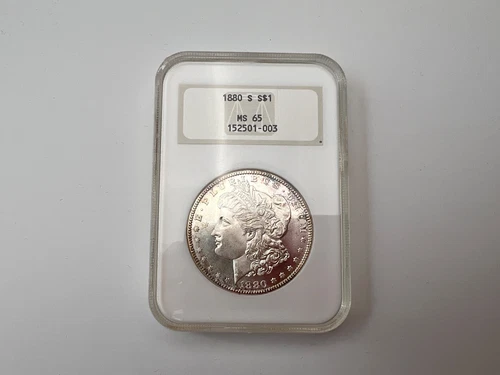 1880 Morgan Silver Dollar Coin - Spotty Edge Toning - NGC Graded MS65