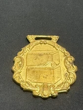 WF-141 VINTAGE WATCH FOB F MEYER & BRO CO THE HANDY FURNACE PIPE & FITTINGS