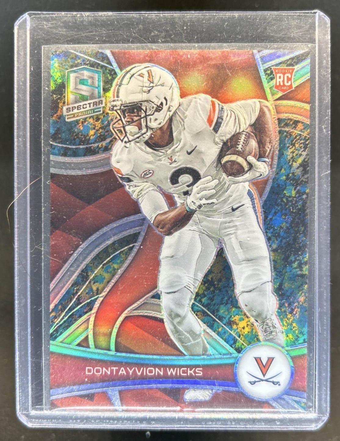 Dontayvion Wicks Panini Chronicles Draft Picks Spectra #71 Neon Splatter