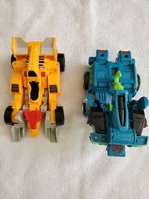 Lot Of 2 Transformers. Switch & Go Dinos Quiver and Hoist Tow Truck Rescue Bot