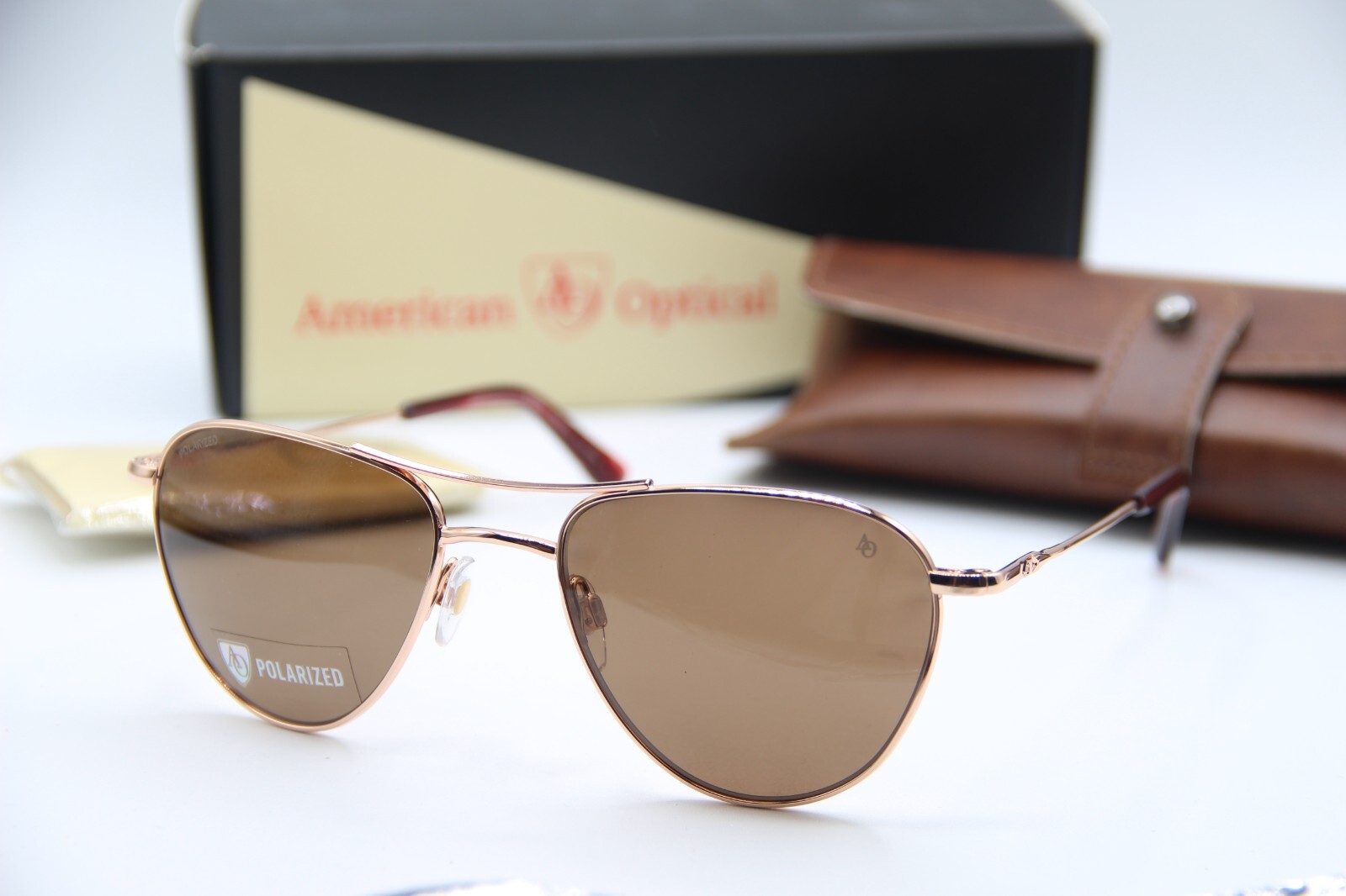 New American Optical Sebring Rose Gold C2 Polarized Sunglasses 55-19 Authentic