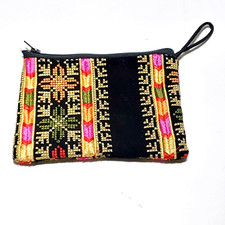 A Palestinian hand-embroidered women's wallet, a heritage handbag, a souvenir gi