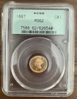 Photo of a 1887-P Gold Dollar from an eBay listing that sold on May 30, 2026