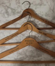 Lot Of Eight Wooden Advertising Hangers