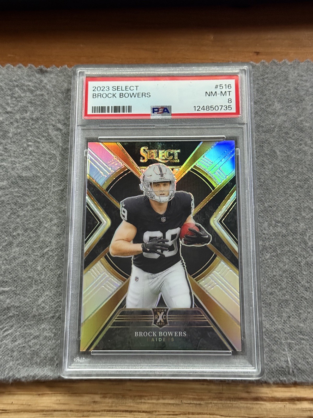 2023 Panini Select - 2024 XRC Prizm Brock Bowers #516 (RC) Oakland Raiders PSA 8