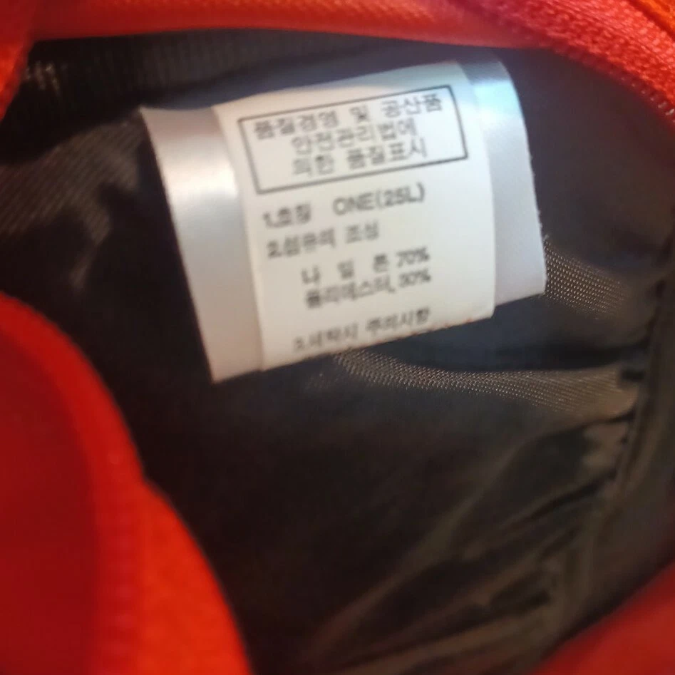 The North Face Tellus 25 Backpack Orange