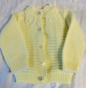 yellow button up sweater
