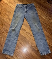 Vintage distressed wranglers straight cut light washed jeans