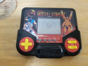 mortal kombat tiger handheld