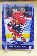 2024-25 OPC Base Blue Parallel #310 Nikita Zaitsev - Chicago Blackhawks