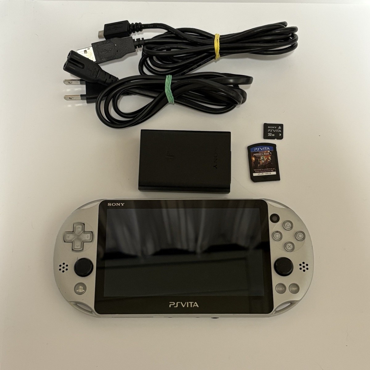 psvita    カセット  32ギガ SONY PlayStation PS Vita Wi-Fi PCH-2000ZA25 Silver Console Japan+
