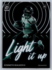 2022 Donruss Optic #LU-16 Kenneth Walker III Rookie RC Black Light it Up