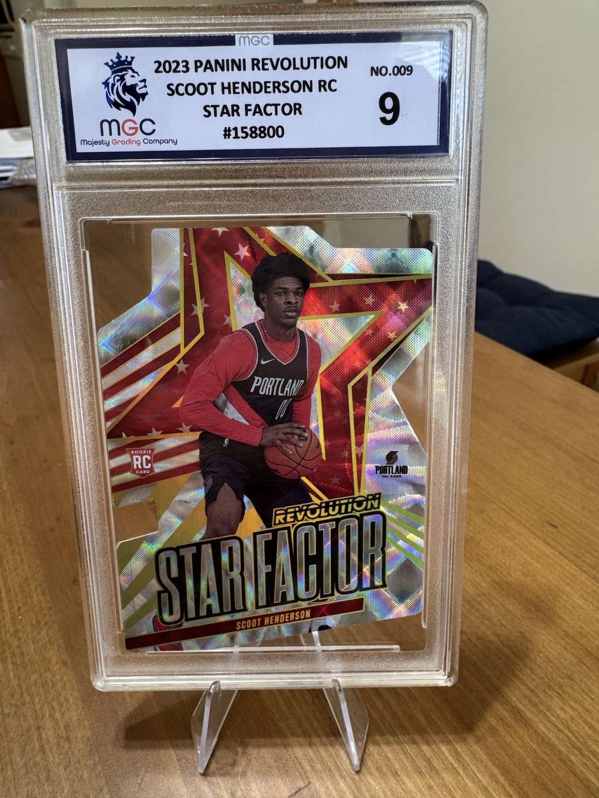 2023-24 Panini Revolution #9 Scoot Henderson Star Factor RC MGC 9