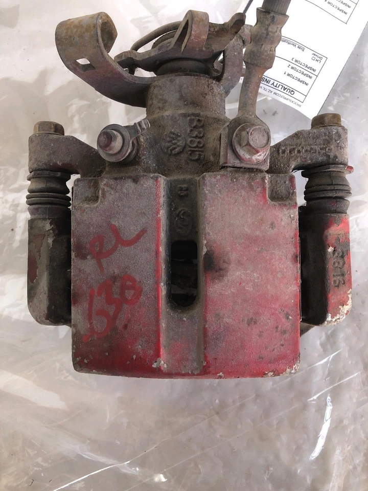 Chevrolet Malibu 2004-2012 pinza de freno trasera parada hardware conductor izquierdo LH OEM Foto 3 de 4