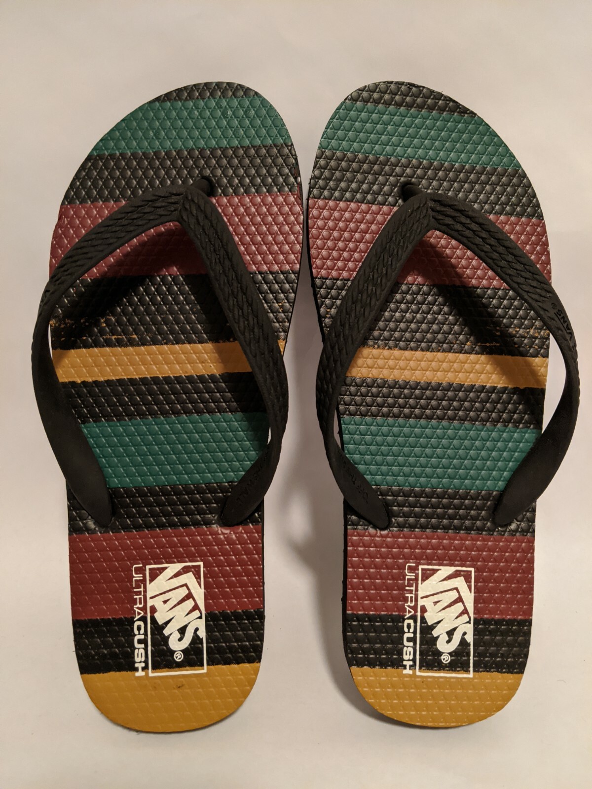 vans rasta flip flops