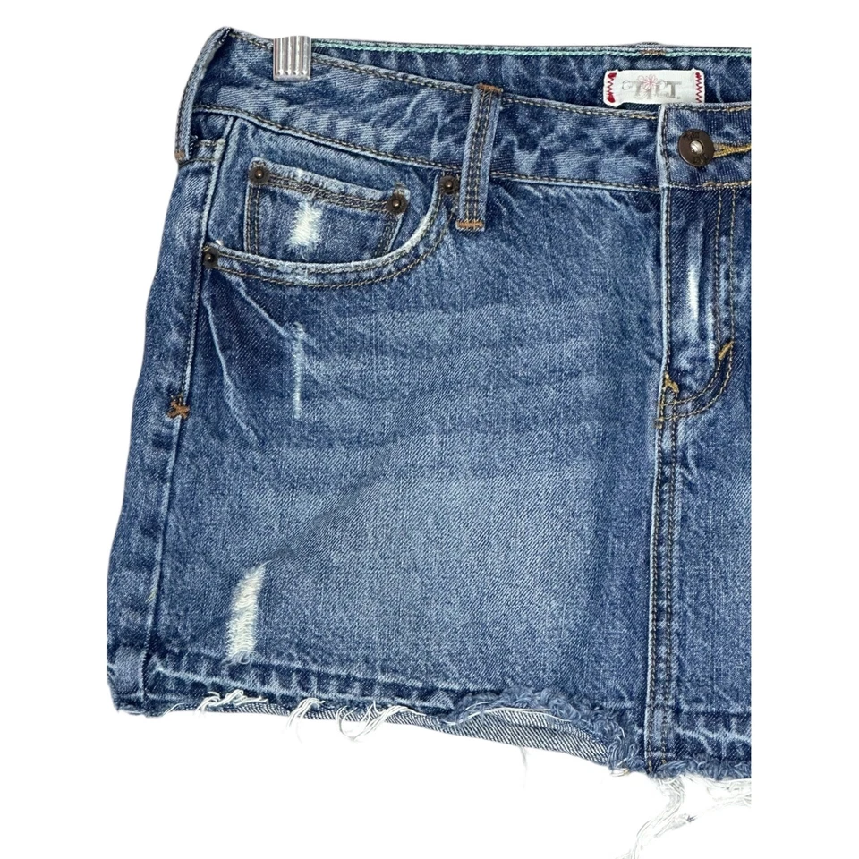 Mini falda de mezclilla inclinable para mujer 7 Y2K tiro bajo dobladillo crudo Britney Paris Grunge Foto 4 de 4