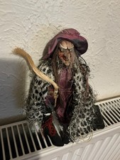 Purple Hanging Witch Figure Witch Doll with broom. Approximately 9”