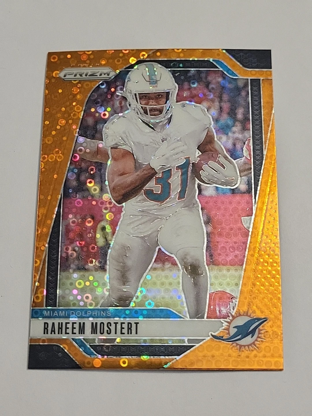 2024 Panini Prizm Raheem Mostert Orange Disco Prizm #178 Miami Dolphins