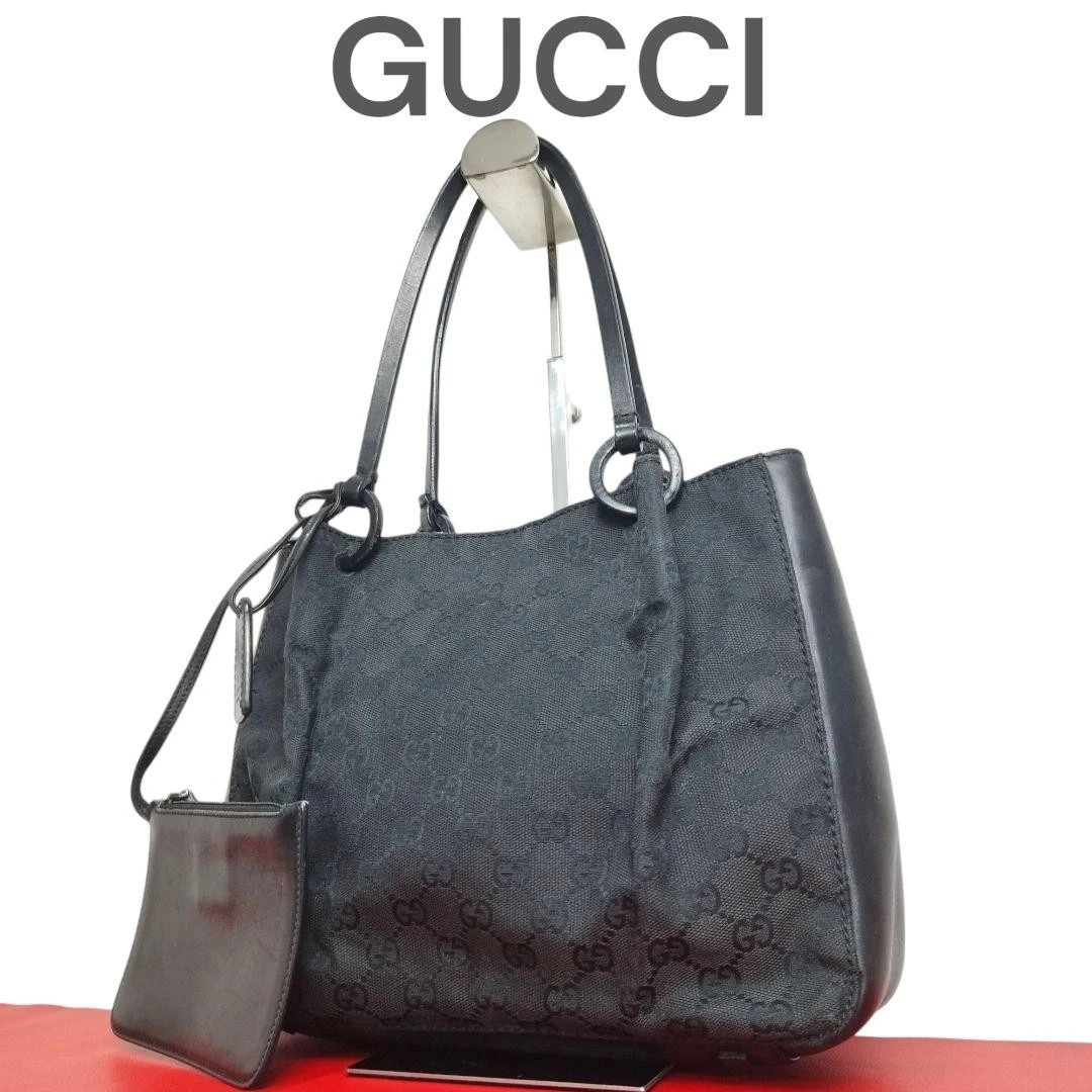 Gucci sac fourre tout toile cuir Gg Supreme avec pochette m2_0501