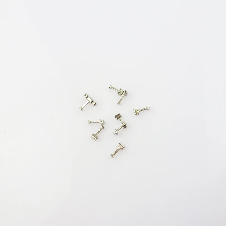 10 piezas Paradas dentales Ortodoncia Ganchos Prensables Cortos/Largos/Izquierdos Tubos Cruzados Brackets Foto 3 de 4