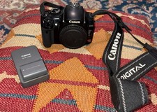 Canon EOS Rebel XTi 10.1 MP Digital Camera Body Battery Charger Tested No Lens