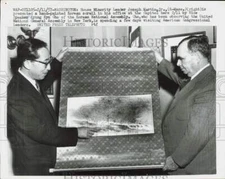 1957 Press Photo Joseph Martin, Jr. gets a Korean scroll from Kyung Kyu Cho