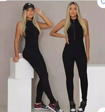 NWT Black Ribbed Zip Front Bodysuit Or Catsuit Size Medium. HOT