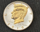 DANBURY MINT,    2010-P  KENNEDY HALF DOLLAR -  GOLD AND SILVER PLATED