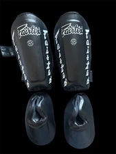 FAIRTEX SP7 TWISTED SHIN PADS BLACK MUAY THAI KICK BOXING MMA K1 SAFETY