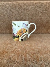 Petite tasse avec fleur Moo par Lucy Tidbury