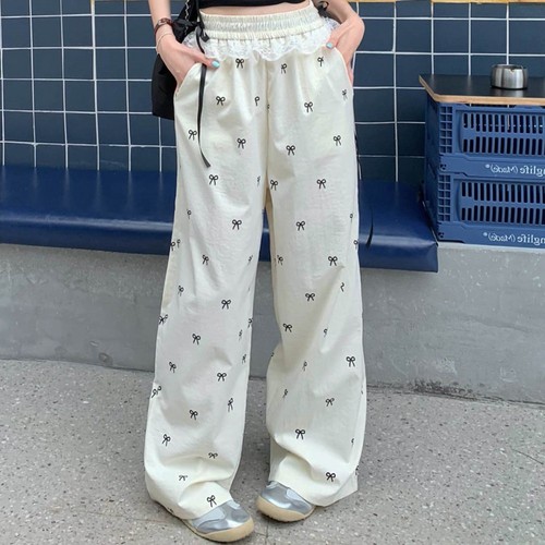 Moderne Damenhose mit weitem Bein und bezaubernder Schleife und Spitzendesign - Bild 11 von 32