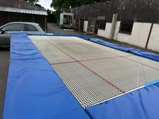 Universal Grand Master 6mm trampoline with lift lower roller stands