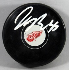 JAMES REIMER SIGNED DETROIT RED WINGS Puck NHL STAR GOALIE AUTOGRAPHED +COA
