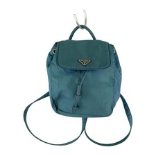 Autentico zaino PRADA blu con cartoncino triangolare logo placca donna