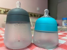 Gray teal Nanob b Bottles. Lightly used, silicone bottles with latex nipples.