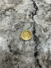 Lot of 10 .999 fine gold 1/200 oz each sealed in capsule