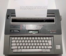 Smith Corona SD650 Electric Typewriter Spell Right With Cover & 2 New Ribbons thumbnail