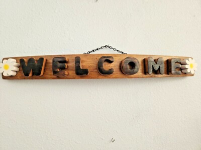 Wood Sign Wine Stave says ''Welcome'', Flowers on ends Letters Cut from Wine Barre