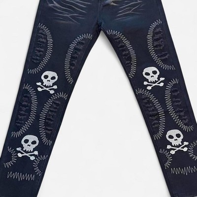 Distressed skull patch black jeans