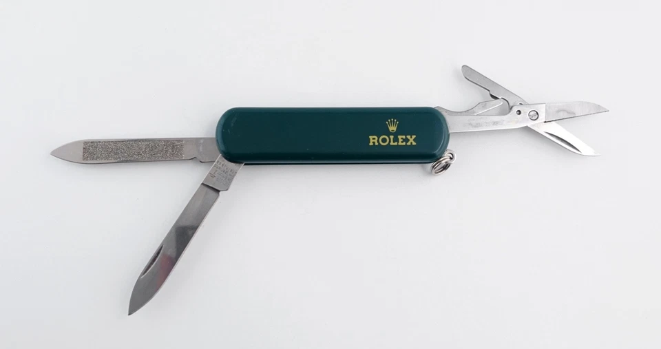 Navaja de bolsillo Rolex / multiherramienta con soporte de cuero firmado (artículo #439) Foto 4 de 4