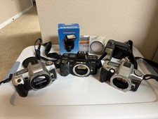 Minolta SLR 35mm Film Cameras with Lens  Filt...