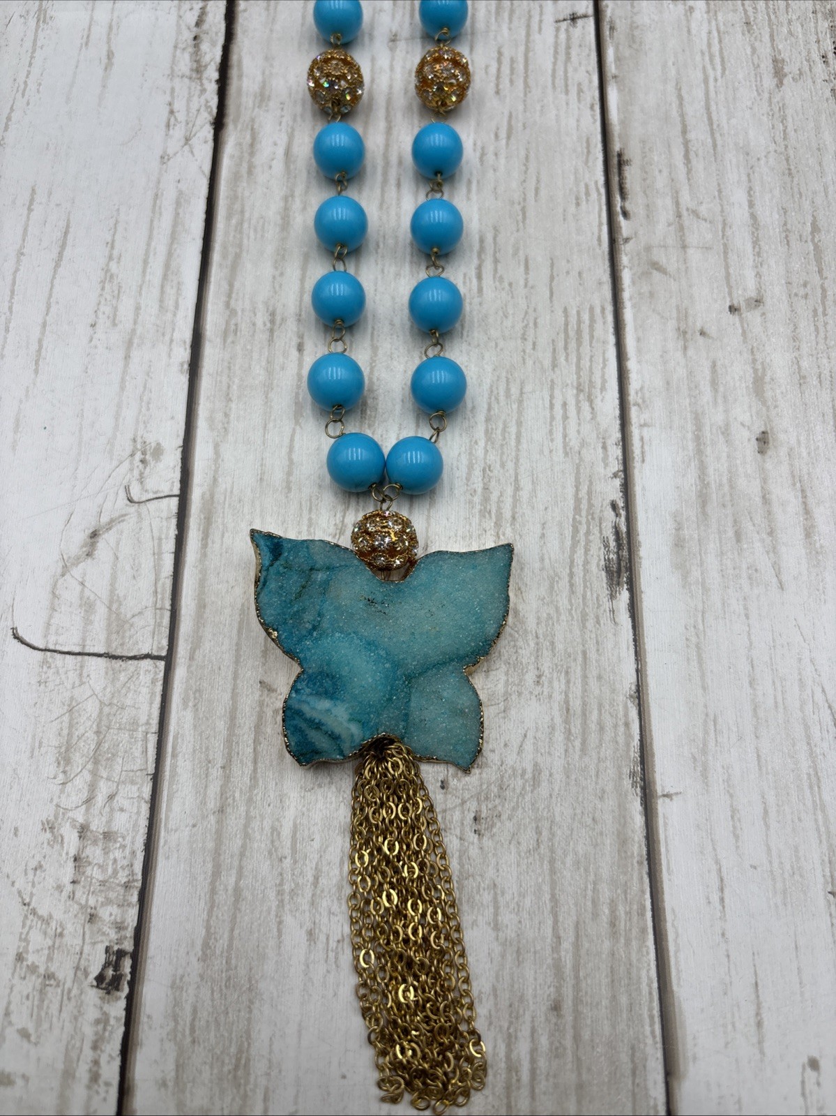 Blue Butterfly Statement Necklace with Gold-Tone Tassel Beaded Chain
