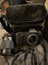 UNTESTED Vintage Canon T50 35mm SLR Film Camera with telephoto lens/film/bag