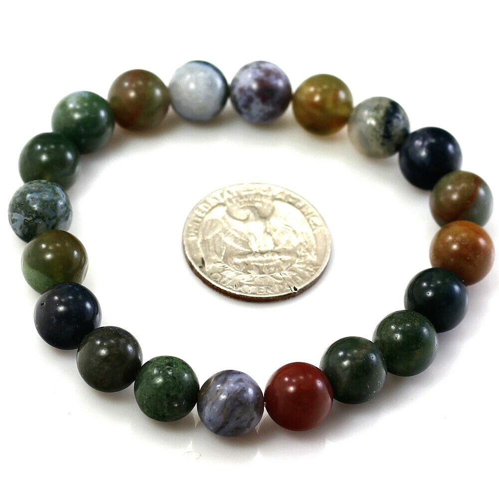 Bracciale elastico in vera pietra naturale Howlite con distanziator... | su