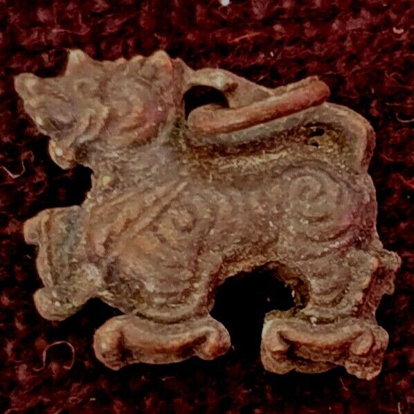Small brass Tibetan dragon amulet charm pendant Nepal India approx. 1.5 cm