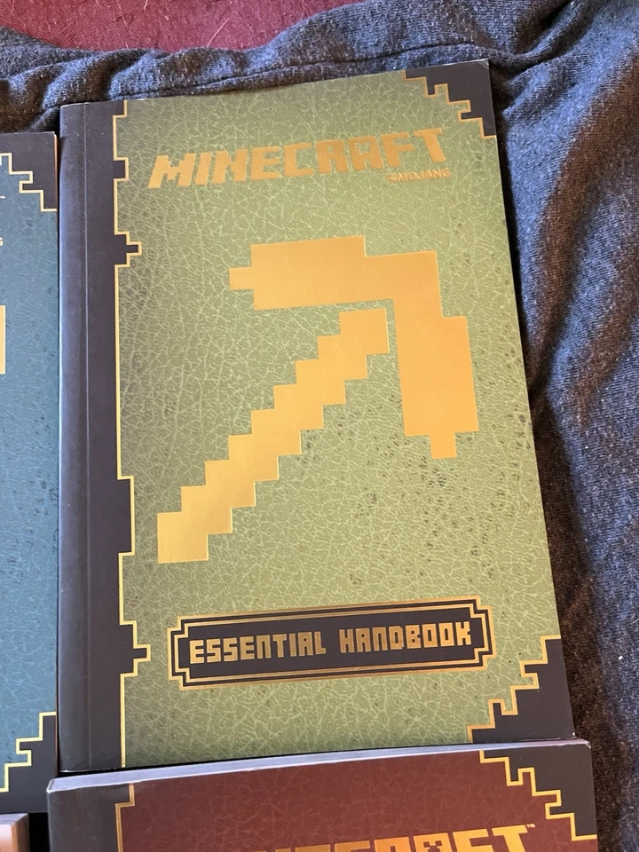 Lot of 4 Updated Minecraft Handbooks Construction, Redstone, Essential, Combat - Image 2 of 4