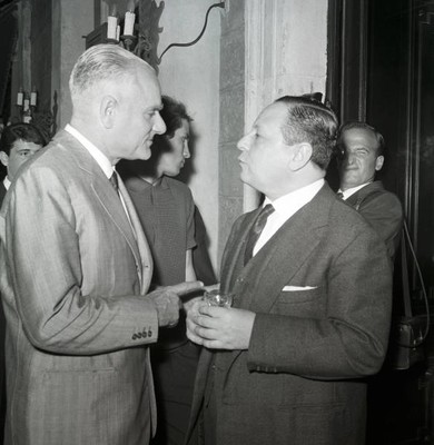 Italian writers Alberto Moravia and Sandro De Feo chatting at a co- Old Photo