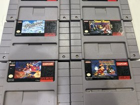 Nintendo NES & SNES Game Cartridge Mixed Lot - Jurassic Park, TMNT, Aladdin